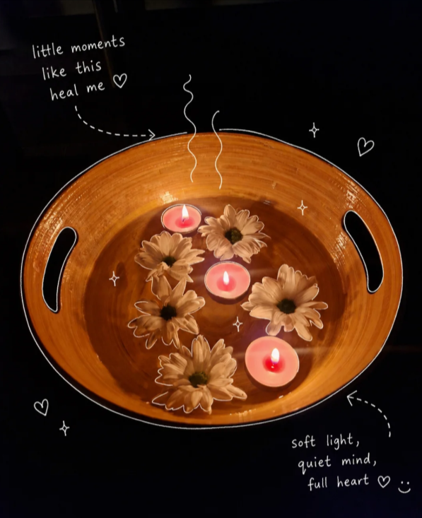 Candlelit ritual bowl with floating flowers at Eluna Skin Rituals